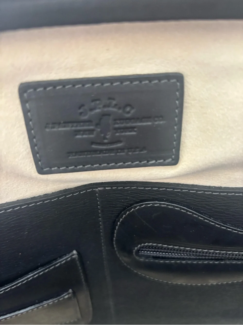 Courier Ruc Case in black grain leather
